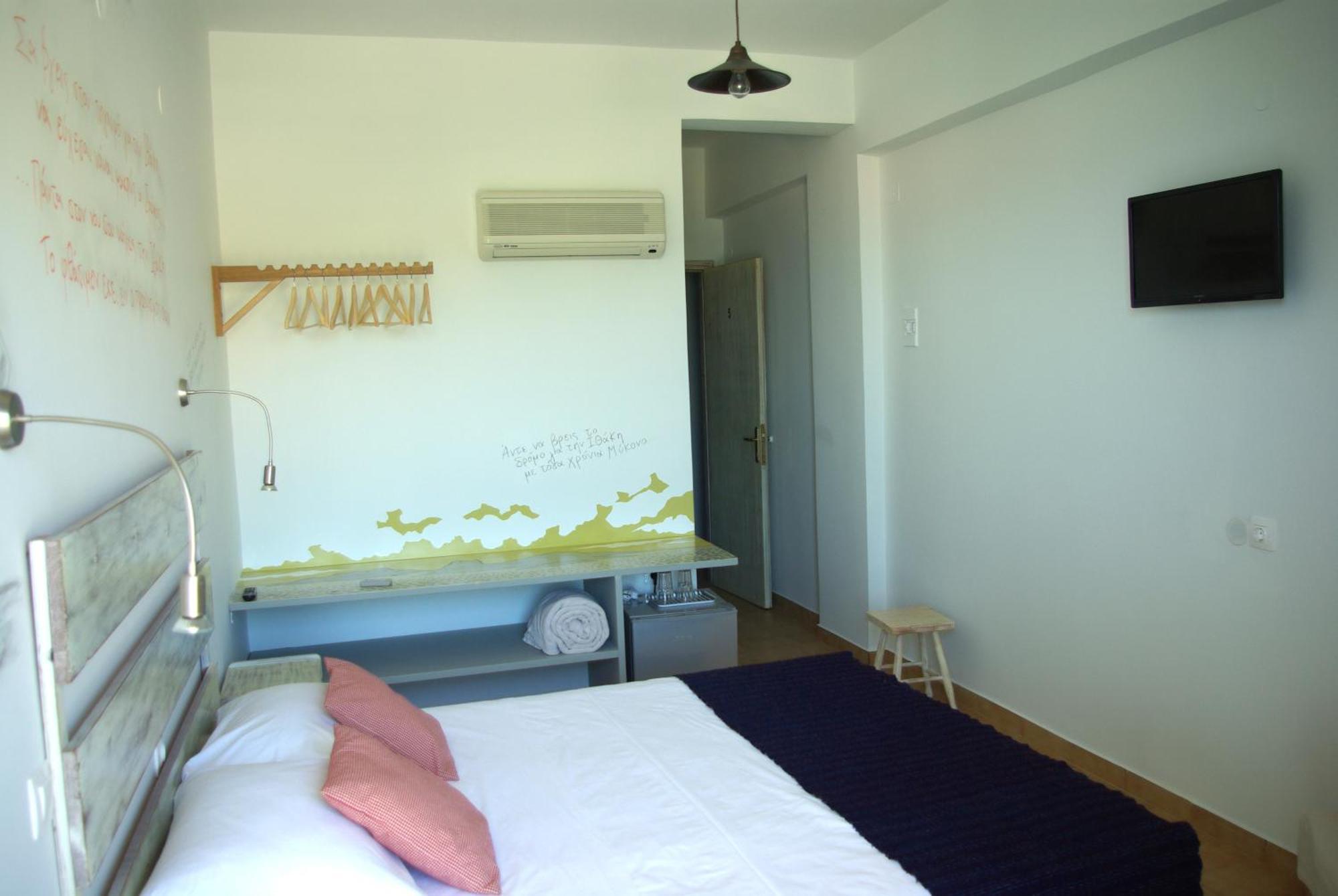 Ammos Tolo Hotell Rum bild